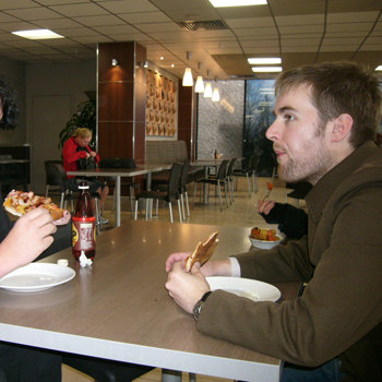 man eating pizza